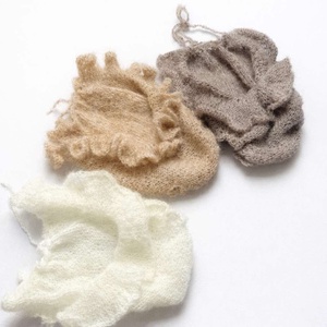 Kézzel kötött fodros újszülött body  - Meska.hu