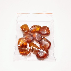 Csiszolt borostyán kövek kifurva - kellékek & szerszámok - gyöngyfűzés kellékek - féldrágakő - Meska.hu