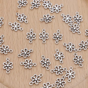 Antik ezüst virág köztes 0.9 x 1.5 cm - Meska.hu