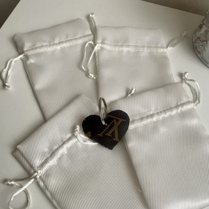 Eladó L.V. szív alakú kulcstartó - Meska.hu