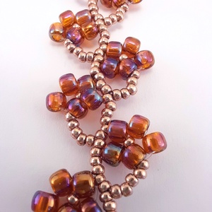 Gyöngyös virágos, szivárványos narancs színű karkötő - ékszer - karkötő - gyöngyös karkötő - Meska.hu