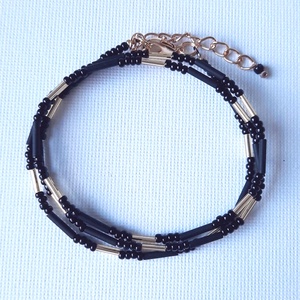 Fekete és arany, 3 soros karkötő - ékszer - karkötő - gyöngyös karkötő - Meska.hu