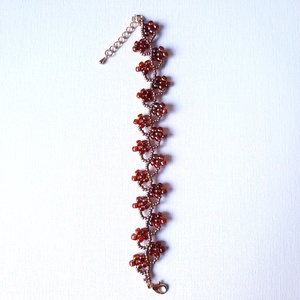 Gyöngyös virágos, szivárványos narancs színű karkötő - ékszer - karkötő - gyöngyös karkötő - Meska.hu