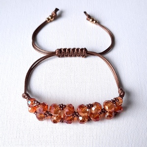 Narancs színű csiszolt üveg, viaszolt zsinóros karkötő - ékszer - karkötő - gyöngyös karkötő - Meska.hu