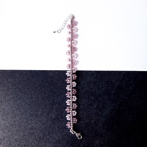 Gyöngyös virágszirmos, lilás-rózsaszínes karkötő - ékszer - karkötő - gyöngyös karkötő - Meska.hu