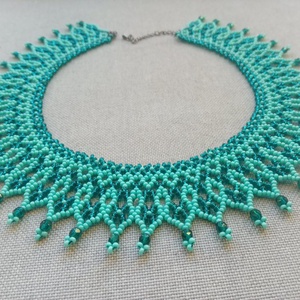 Kézzel fűzött türkiz nyaklánc népi motívummal - Meska.hu