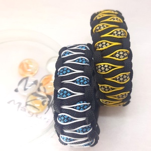 Paracord karkötő Varázs szemek aranyos sárgában - ékszer - karkötő - fonott karkötő - Meska.hu