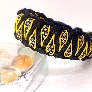 Paracord karkötő Varázs szemek aranyos sárgában - ékszer - karkötő - fonott karkötő - Meska.hu