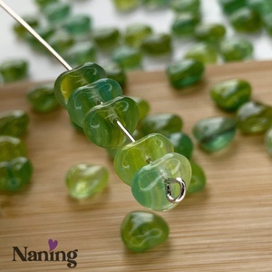 Cseh üveggyöngy - preciosa - szivecske - átlátszó zöld/sárga - 20db - kellékek & szerszámok - gyöngyfűzés kellékek - egyéb alkatrész - Meska.hu