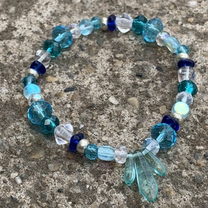 Preciosa cseh üveggyöngy gumis karkötő - türkizkék/átlátszó - ékszer - karkötő - gyöngyös karkötő - Meska.hu
