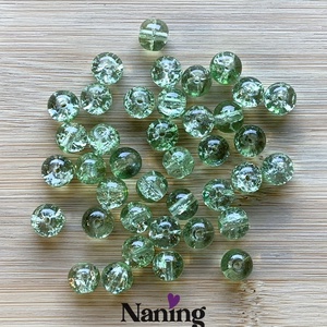 30db roppantott üveggyöngy - 8mm - átlátszó/zöld (13ft/db) - kellékek & szerszámok - gyöngyfűzés kellékek - üveggyöngy - Meska.hu