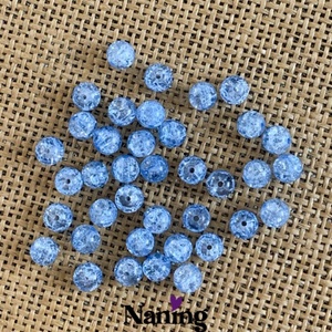 30db roppantott üveggyöngy - 8mm - átlátszó/világoskék (13ft/db) - kellékek & szerszámok - gyöngyfűzés kellékek - üveggyöngy - Meska.hu