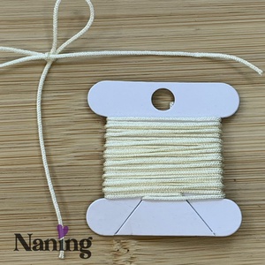 10 méter selyem ékszerzsinór - vajszín - 0,8mm  (50ft/m) - kellékek & szerszámok - rövidáru - fonal, cérna - kevert fonal - Meska.hu