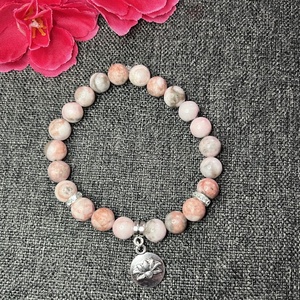 Zebra jáspis karkötő lótusz medállal - ékszer - karkötő - gyöngyös karkötő - Meska.hu