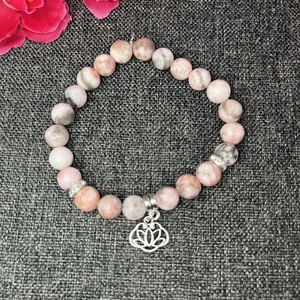 Zebra jáspis karkötő lótusz medállal - ékszer - karkötő - gyöngyös karkötő - Meska.hu