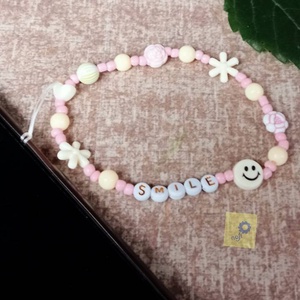 Mobil dísz / phone charm - pasztell árnyalat, arany smile felirattal  - ékszer - karkötő - charm karkötő - Meska.hu