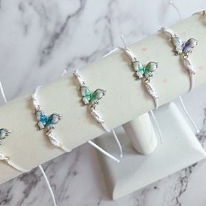 Pillangós karkötő - ékszer - karkötő - karkötő medállal - Meska.hu