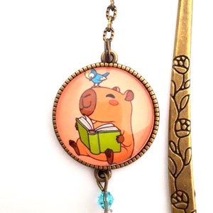 Vidám olvasó kapibara kismadárral - Meska.hu