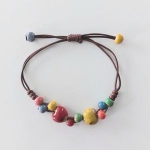 Makramé karkötő kerámia gyöngyökkel  - ékszer - karkötő - fonott karkötő - Meska.hu