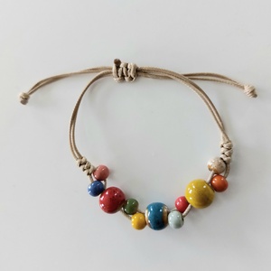 Makramé karkötő kerámia gyöngyökkel  - ékszer - karkötő - fonott karkötő - Meska.hu