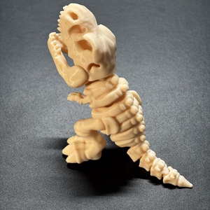 Flexi T-Rex dinoszaurusz figura - Mozgatható gerincű 3D nyomtatott T-Rex csontváz, fidget játék és asztali dísz, 12 cm - otthon & életmód - dekoráció - dekoratív figurák és szobrok - Meska.hu