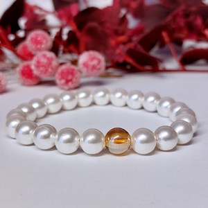 Ünnepi téli karkötő fehér tekla gyöngyből, aurakvarccal - ékszer - karkötő - gyöngyös karkötő - Meska.hu