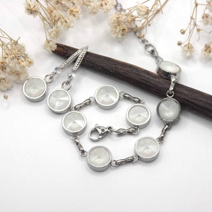 Nemesacél karkötő és fülbevaló szett selyemfényű fehér Swarovski kristályokkal - Milkglass - ékszer - ékszerszett - Meska.hu