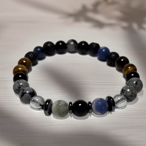 Theta ásványkarkötő - önbizalom - tigrisszem, ónix, hópehely obszidián, szodalit, hegyikristály, hematit - Meska.hu