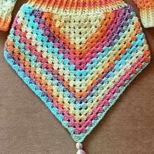 Vidám, színátmenetes és csillámos fonalból horgolt nyakmelegítő, amelyhez kérésre kézmelegítő és sapka is kérhetőt  - Meska.hu