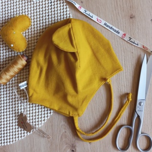 Tavaszi-őszi megkötős gyerek sapka, mustársárga színben - ruha & divat - sál, sapka, kendő - sapka - Meska.hu Tavaszi-őszi megkötős gyerek sapka, mustársárga színben - ruha & divat - sál, sapka, kendő - sapka - Meska.hu