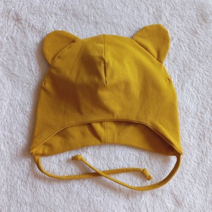 Tavaszi-őszi megkötős gyerek sapka, mustársárga színben - ruha & divat - sál, sapka, kendő - sapka - Meska.hu Tavaszi-őszi megkötős gyerek sapka, mustársárga színben - ruha & divat - sál, sapka, kendő - sapka - Meska.hu