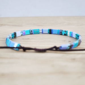 Selymes üveggyöngy karkötő - türkiz - ékszer - karkötő - gyöngyös karkötő - Meska.hu