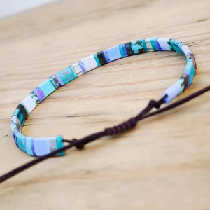 Selymes üveggyöngy karkötő - türkiz - ékszer - karkötő - gyöngyös karkötő - Meska.hu