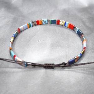 Selymes üveggyöngy karkötő - színes - ékszer - karkötő - gyöngyös karkötő - Meska.hu