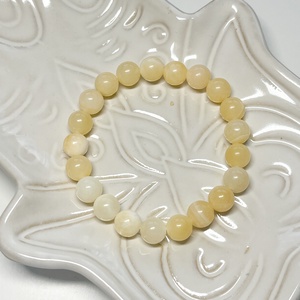 Narancs kalcit ásvány karkötő - Meska.hu