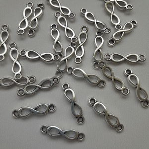 Fém medál, összekötő (íves) - 5x20mm - végtelen jel  - 10 db / csomag - antik ezüst szín, Kellékek & szerszámok, Ékszerkellék, Medál csomag, , MESKA