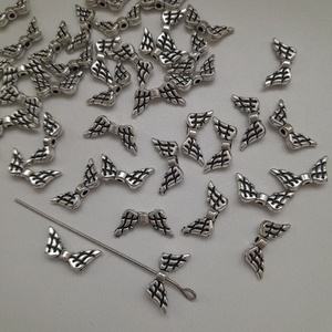 Fém angyalszárny köztes - 14x6mm - antik ezüst szín - választható kiszerelés, Kellékek & szerszámok, Ékszerkellék, Charmok, Ékszerkészítés, MESKA