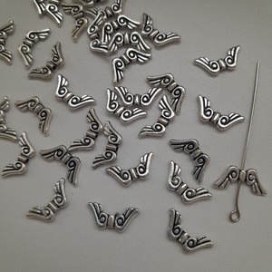 Fém angyalszárny köztes - 16x7mm - antik ezüst szín - választható kiszerelés, Kellékek & szerszámok, Ékszerkellék, Charmok, Ékszerkészítés, MESKA